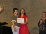 Wife of Hakan Cakmak receives the award from the Director of the Cultural Department