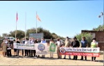 Environmental groups and associations protesting at the gate of the CMC mine  waste depot
