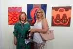 Paintings by Ahmet Özol with Zülal Karliova (left in front) on the opening evening