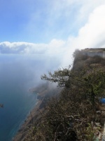 Clouds driven up the cliffs